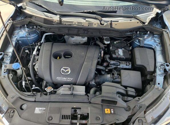 JM3KE4DY4G0795105 2016 MAZDA CX-5 Blue Սալոնի հետևի տեսք