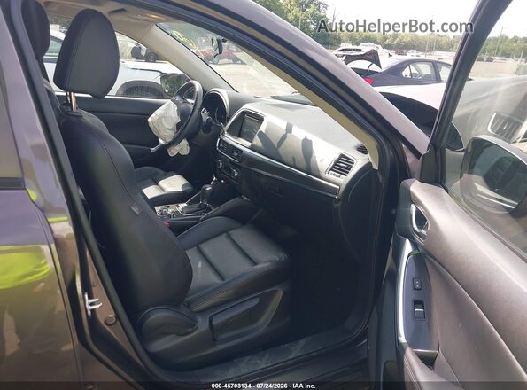 JM3KE4DY4G0904484 2016 MAZDA CX-5 Brown Front interior view
