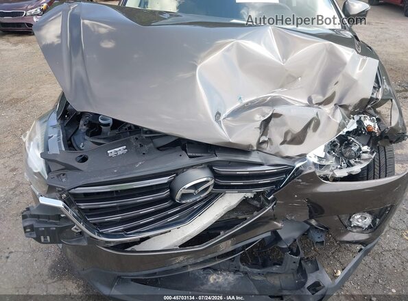 JM3KE4DY4G0904484 2016 MAZDA CX-5 Brown Rear view