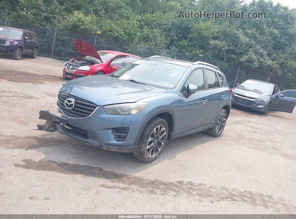 JM3KE4DY5G0736256 2016 MAZDA CX-5 Teal წინა მარცხენა ხედი სამი მეოთხედიდან