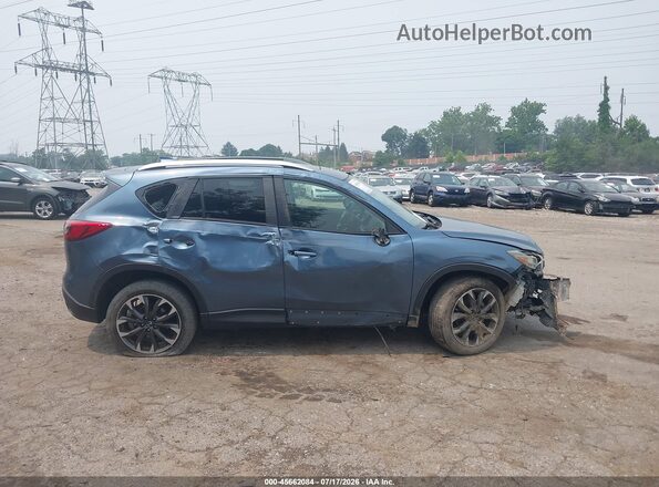 JM3KE4DY5G0736256 2016 MAZDA CX-5 Teal უკანა სალონის ხედი