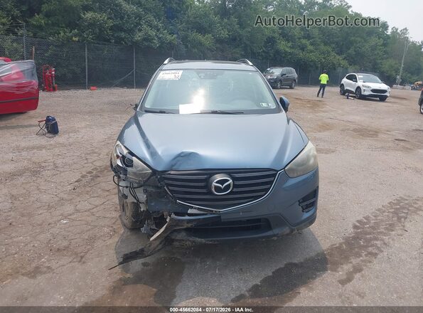 JM3KE4DY5G0736256 2016 MAZDA CX-5 Teal ხელსაწყოთა პანელის ხედი