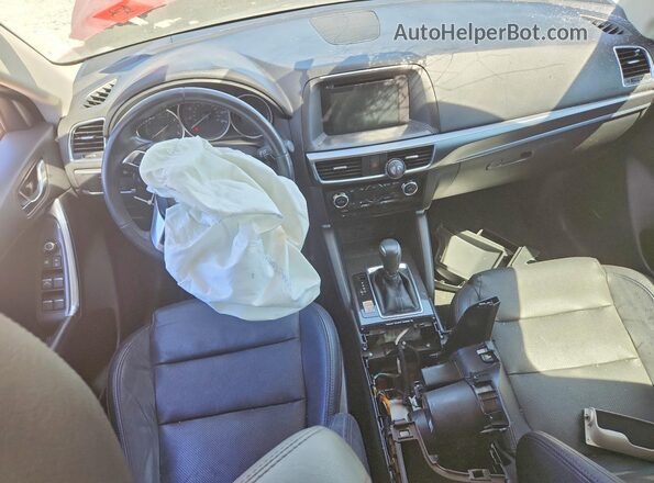 JM3KE4DY6G0794621 2016 MAZDA CX-5 Red Vista del salpicadero