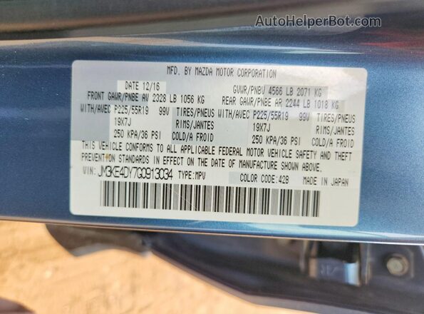 JM3KE4DY7G0913034 2016 MAZDA CX-5 Blue Widok naklejki z numerem VIN