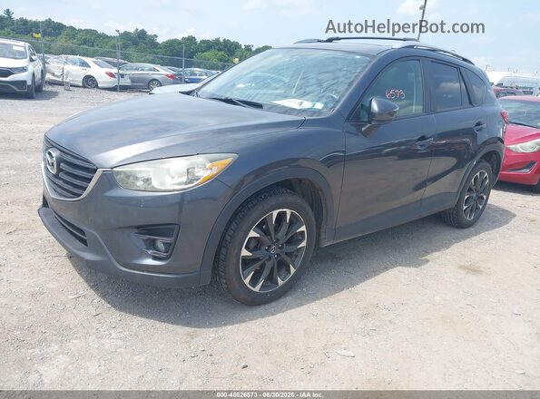 JM3KE4DY8G0607380 2016 MAZDA CX-5 Black Vista tres cuartos delantera izquierda