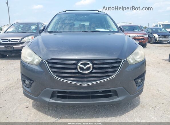 JM3KE4DY8G0607380 2016 MAZDA CX-5 Black Vista del cuadro de instrumentos