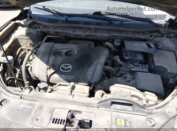 JM3KE4DY8G0627242 2016 MAZDA CX-5 Gray Vista trasera