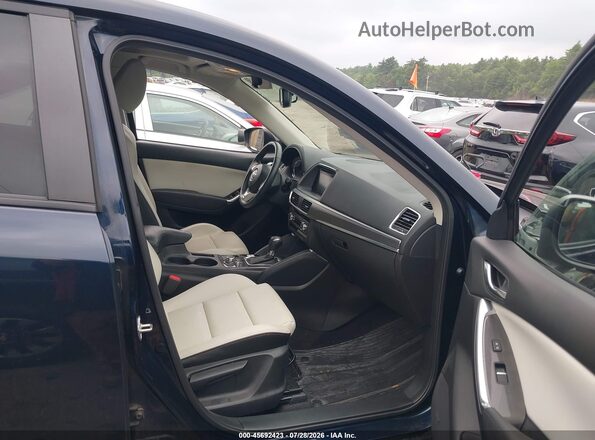 JM3KE4DY8G0628682 2016 MAZDA CX-5 Dark Blue Вид салону спереду