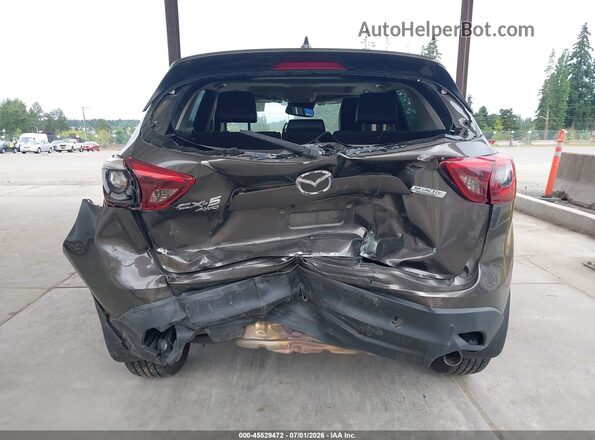 JM3KE4DY8G0823360 2016 MAZDA CX-5 Gray Front view