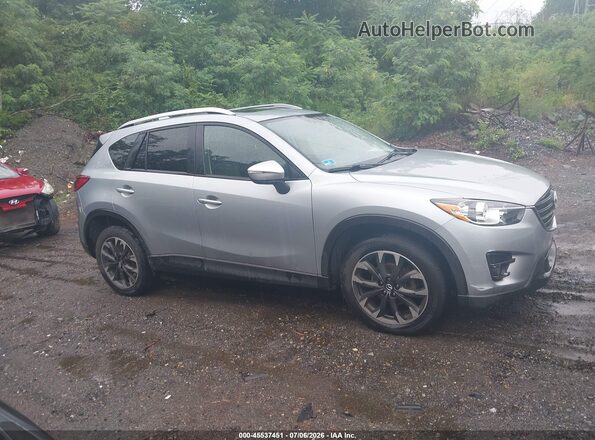 JM3KE4DY8G0840899 2016 MAZDA CX-5 Gray Widok wnętrza z tyłu