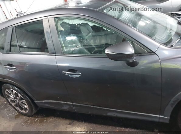 JM3KE4DY9G0769504 2016 MAZDA CX-5 Black Widok wnętrza z tyłu