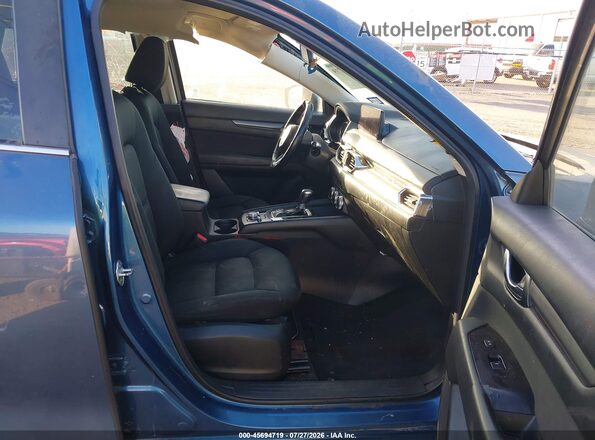 JM3KFABM9M0334733 2021 MAZDA CX-5 Blue წინა სალონის ხედი