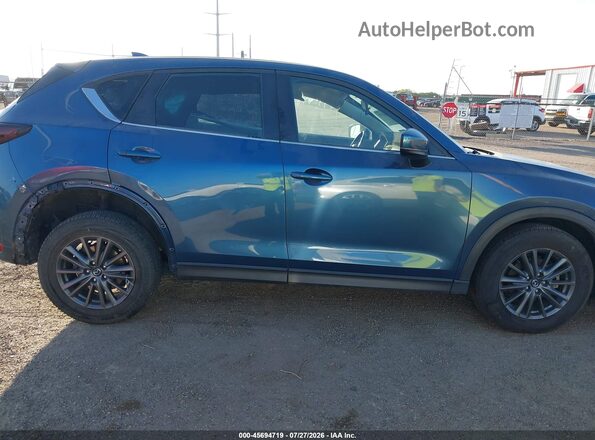 JM3KFABM9M0334733 2021 MAZDA CX-5 Blue ხელსაწყოთა პანელის ხედი