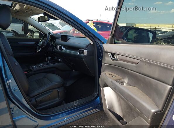 JM3KFACM4K0540408 2019 MAZDA CX-5 Blue Vista interior delantera
