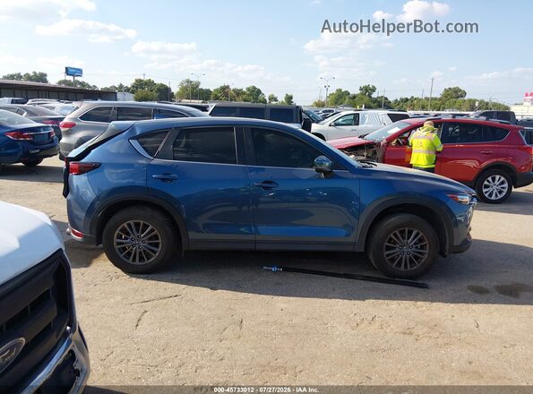 JM3KFACM4K0540408 2019 MAZDA CX-5 Blue Vista interior trasera