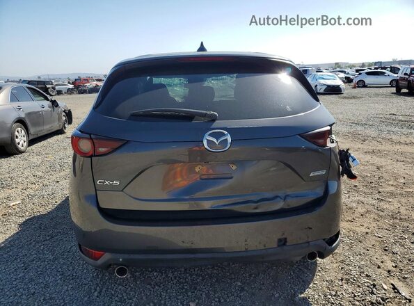 JM3KFACM6K1570214 2019 MAZDA CX-5 Серый Вид сзади