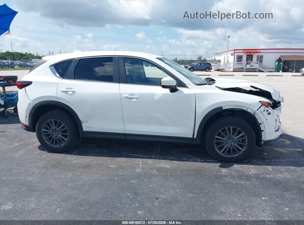 JM3KFACM8M0302791 2021 MAZDA CX-5 White Vista interior trasera