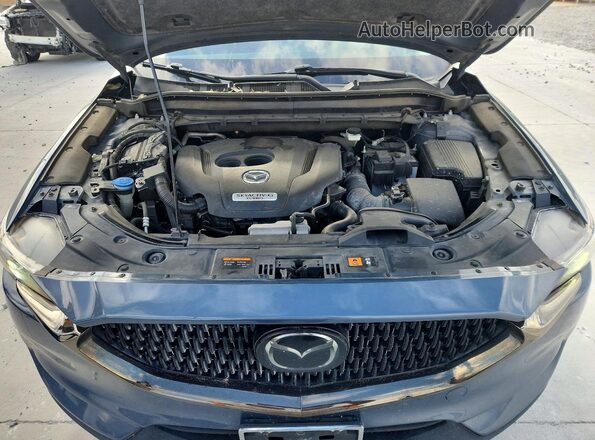 JM3KFACY2M0459851 2021 MAZDA CX-5 Gray Vista del compartimento del motor