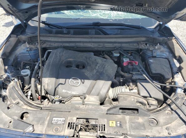 JM3KFADM1L1831202 2020 MAZDA CX-5 Blue Widok wnętrza z tyłu