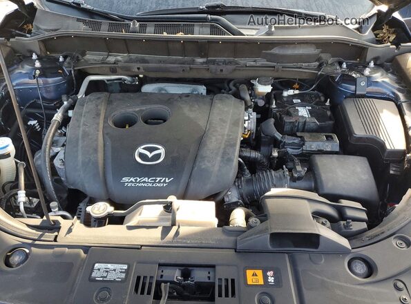JM3KFADM6J1451429 2018 MAZDA CX-5 Blue Vista interior trasera