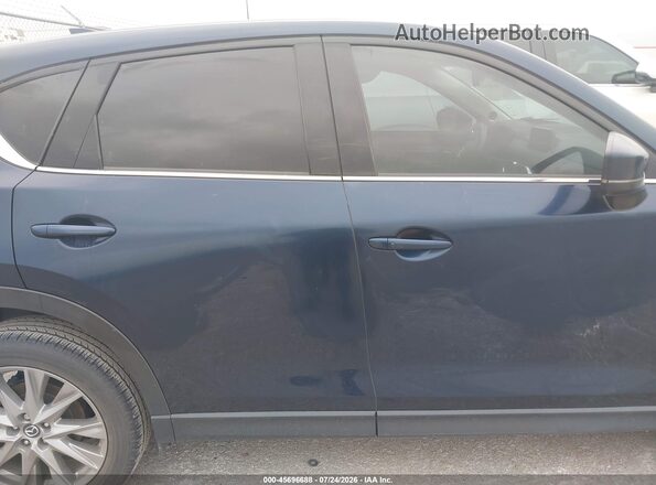 JM3KFADM6L0759466 2020 MAZDA CX-5 Blue Vista interior trasera