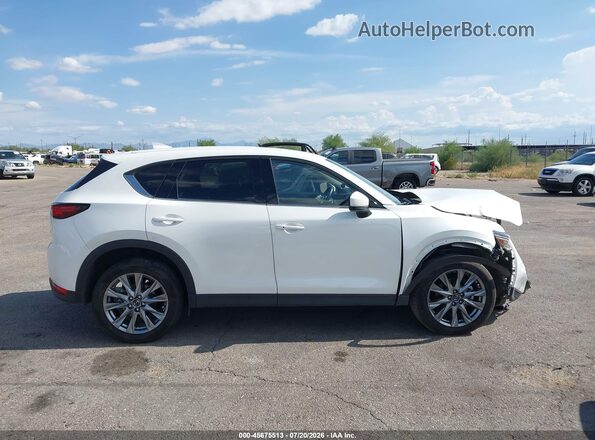 JM3KFBAY5M0473817 2021 MAZDA CX-5 White Vista interior trasera