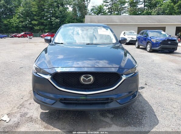 JM3KFBAY6L0818433 2020 MAZDA CX-5 Blue Vista interior trasera