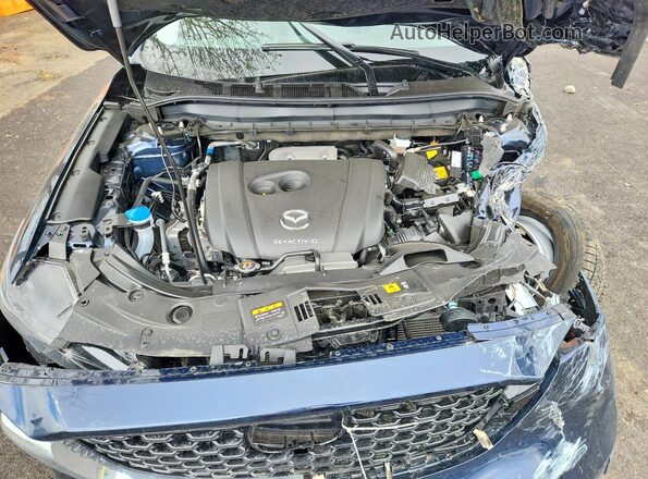 JM3KFBBL2S0803557 2025 MAZDA CX-5 Blue Widok wnętrza z tyłu