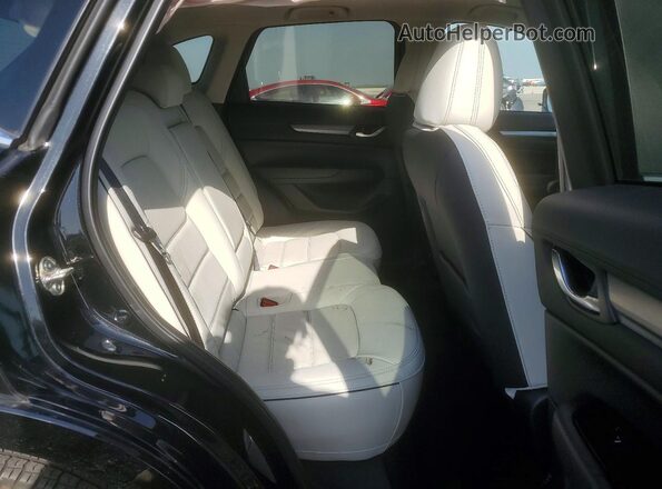 JM3KFBCL2R0499428 2024 MAZDA CX-5 Charcoal Rear interior view
