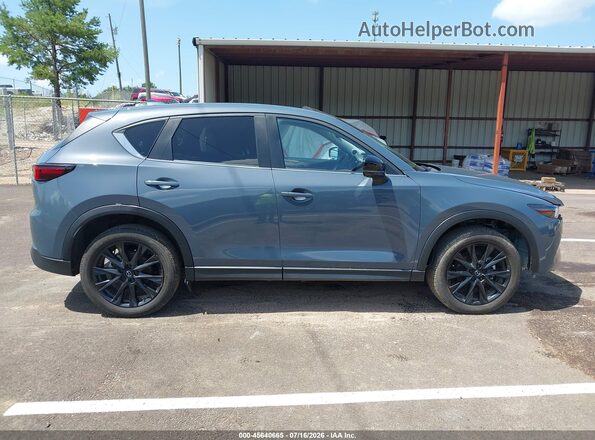 JM3KFBCL3R0420879 2024 MAZDA CX-5 Blue Rear interior view