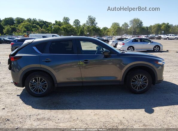 JM3KFBCM0M1336384 2021 MAZDA CX-5 Gray Widok wnętrza z tyłu