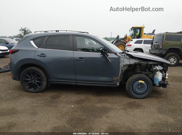 JM3KFBCM2M0430126 2021 MAZDA CX-5 Dark Blue Vista interior trasera