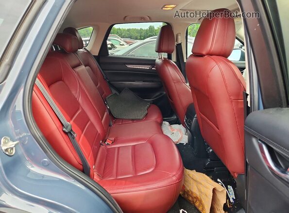 JM3KFBCM5M0494662 2021 MAZDA CX-5 Blue Vista interior trasera