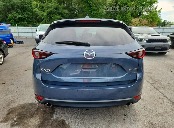 JM3KFBCM5M0494662 2021 MAZDA CX-5 Blue Vista trasera