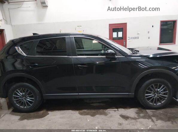 JM3KFBCM6M0483184 2021 MAZDA CX-5 Black Vista interior trasera