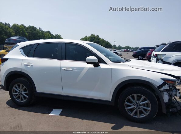 JM3KFBCM6N1572779 2022 MAZDA CX-5 White Vista interior trasera