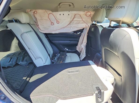JM3KFBCM6S0690347 2025 MAZDA CX-5 Blue Vista de los asientos traseros