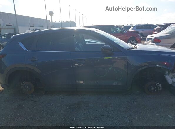JM3KFBCM6S0693832 2025 MAZDA CX-5 Blue Սալոնի հետևի տեսք