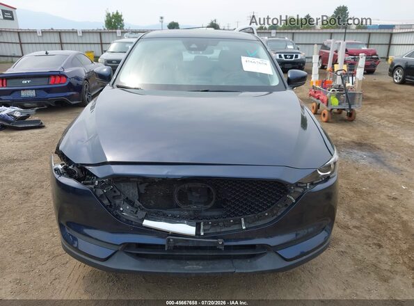 JM3KFBCM7J0381369 2018 MAZDA CX-5 Blue Vista interior trasera