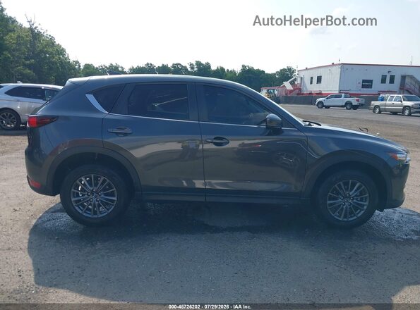 JM3KFBCM7M0362728 2021 MAZDA CX-5 Gray Widok wnętrza z tyłu