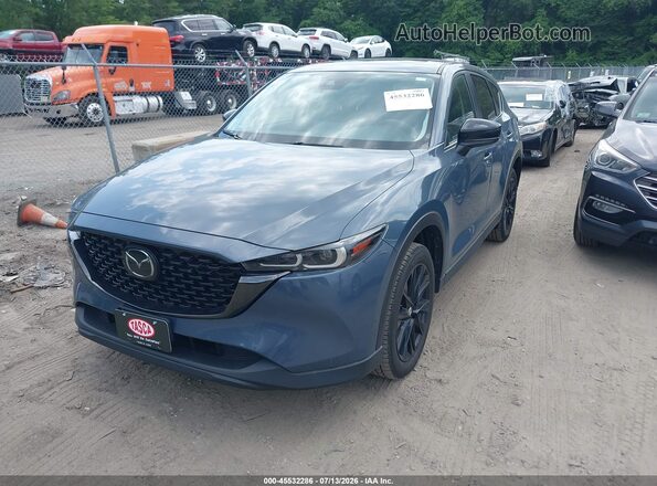 JM3KFBCM7N0614768 2022 MAZDA CX-5 Blue Vista tres cuartos delantera izquierda