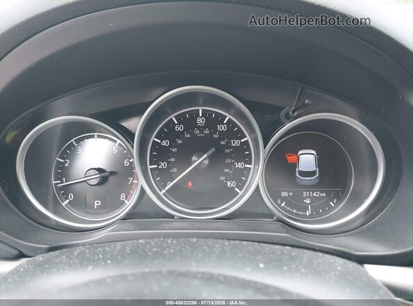 JM3KFBCM7N0614768 2022 MAZDA CX-5 Blue Vista de los asientos traseros