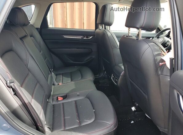 JM3KFBCM8P0208937 2023 MAZDA CX-5 Blue Vista de los asientos traseros