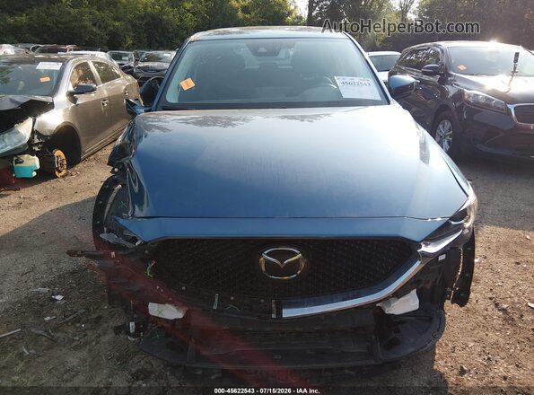 JM3KFBCM9M0334641 2021 MAZDA CX-5 Blue Widok wnętrza z tyłu