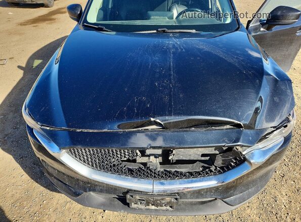 JM3KFBCM9M1355774 2021 MAZDA CX-5 Черный Вид задней части салона