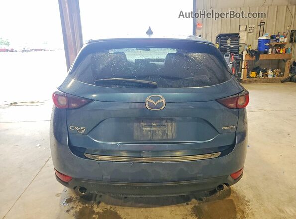 JM3KFBCMXM1499477 2021 MAZDA CX-5 Blue Rear view