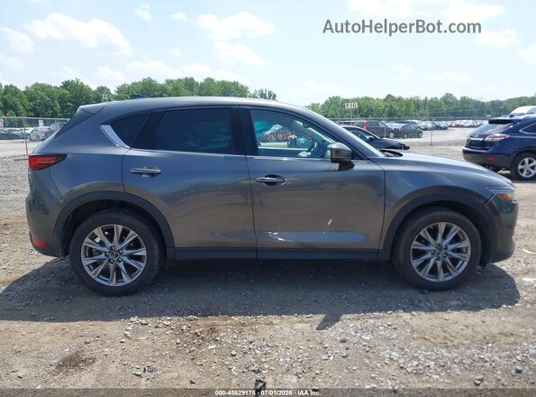JM3KFBDM2L1834003 2020 MAZDA CX-5 Gray Vista interior trasera