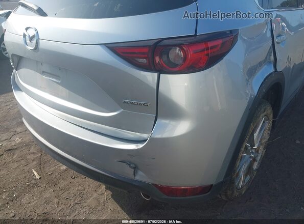JM3KFBDM3M0355578 2021 MAZDA CX-5 Silver Widok wnętrza z tyłu