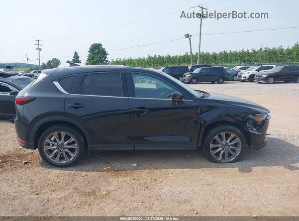 JM3KFBDM4M0338496 2021 MAZDA CX-5 Black Widok wnętrza z tyłu