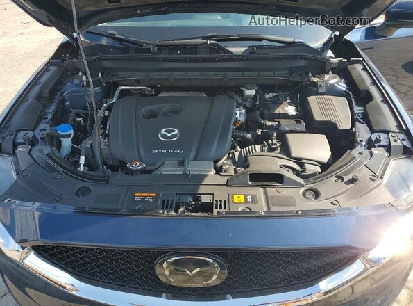 JM3KFBDM4M0489113 2021 MAZDA CX-5 Blue Vista del compartimento del motor